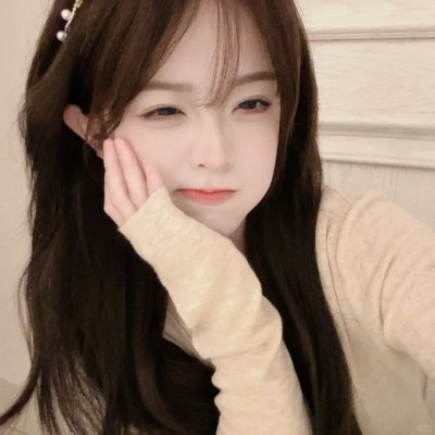 彼女